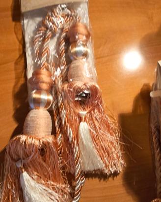 Bracciale per drappeggio tende