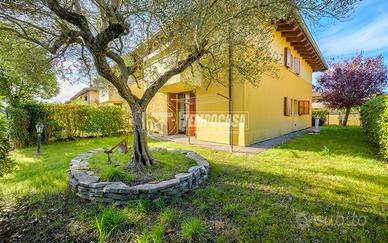 TRILOCALE AL PIANO TERRA CON GIARDINO E GARAGE IN