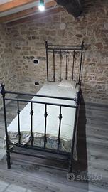 Letto singolo in ferro battuto