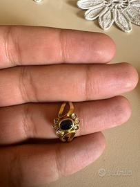 Anello in oro 18K con zaffiro e diamanti