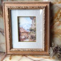 Dipinto in un'imponente cornice passe-partout