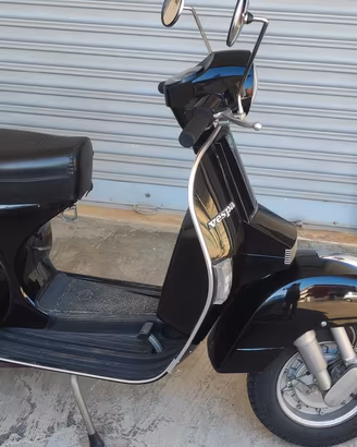 vespa 125 px arcobaleno iscritta FMI