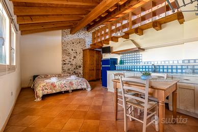 Camera con cucina e bagno privato