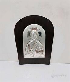 Cristo. Icona sacra di Cristo in argento con corni