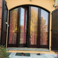 Infissi   in noce centinati  PZ 2 con doppi vetri