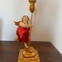 Candeliere con putto