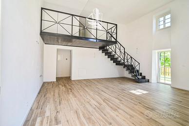 Elegante quadrilocale con giardino