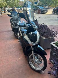 Sh 300 i
