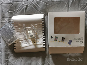 Filo di lucine Flying Tiger con mollette per foto