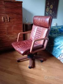 Poltrone in legno e pelle