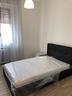 viale-don-minzoni-camera-arredata