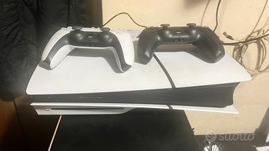 Ps5 + 2 controller + 5 giochi + base raffedda