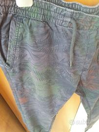 Pantalone ragazzo  a fiori tonalità blu