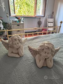 Coppia angioletti pensierosi in gesso
