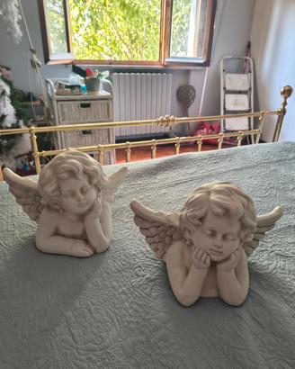 Coppia angioletti pensierosi in gesso