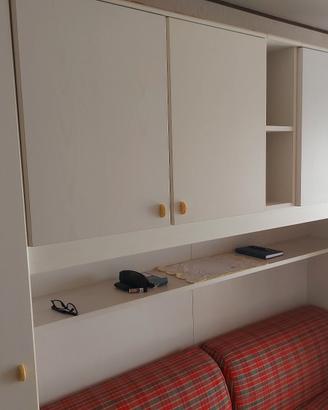 Camera soggiorno con divano letto 