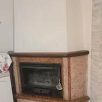 Rivestimento camino ad angolo