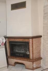 Rivestimento camino ad angolo