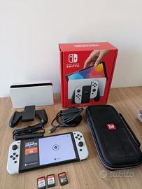 Nintendo Switch OLED + giochi e accessori
