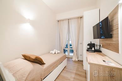 Camera singola bagno e balcone privato