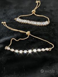 Coppia braccialetti acciaio dorato e cristalli