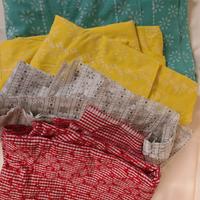 Stock stoffa cotone ricamato 