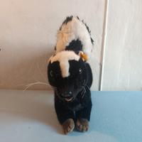 Peluche Steiff puzzola (skunk)  – Knopf im Ohr