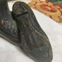 Statuetta scarpe pubblicità marchio