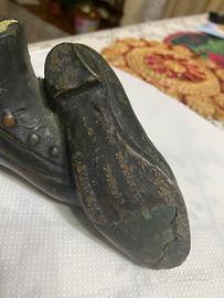 Statuetta scarpe pubblicità marchio