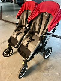 Passeggino gemellare Bugaboo con accessori