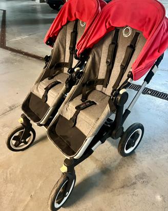 Passeggino gemellare Bugaboo con accessori
