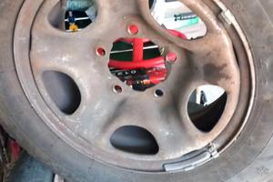 4 gomme termiche  205/70 R15 con cerchi Suzuki 