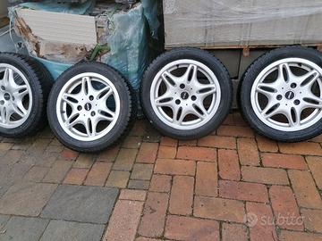 8 cerchi in lega + gomme complete smart