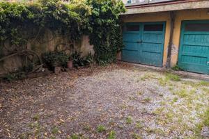 GARAGE E POSTO AUTO in cortile chiuso