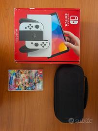 Nintendo switch oled con custodia e Mario Kart