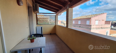 Bilocale arredato con veranda coperta