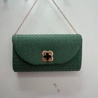 Pochette da sera verde smeraldo con brillantini 