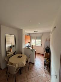 Camera singola luminosa con balcone