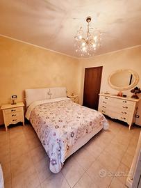 letto matrimoniale dal design elegante