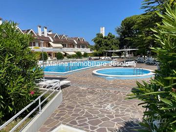 APPARTAMENTO CON GIARDINO PRIVATO E GARAGE