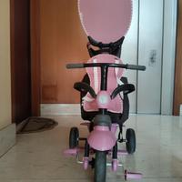 Triciclo evolutivo SmarTrike rosa con maniglione