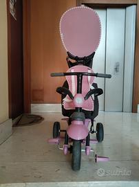 Triciclo evolutivo SmarTrike rosa con maniglione