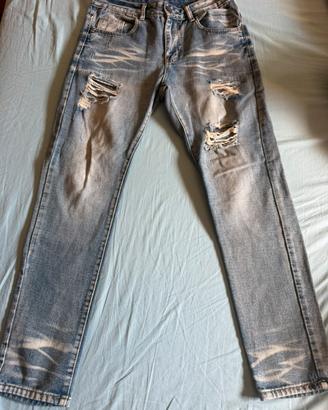 Jeans strappati