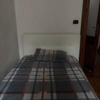 Letto contenitore ad 1 piazza e mezzo.