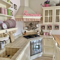 Cappa aspirante angolare