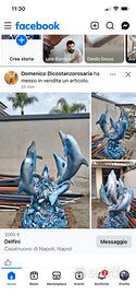 Delfini in bronzo