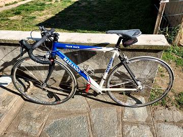 bicicletta da corsa per adolescente