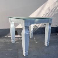 Tavolo design in marmo e vetro