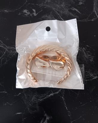 bracciale più orecchini