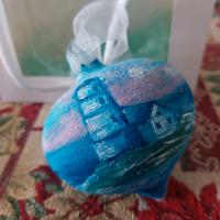 Sfera in vetro diventa a mano